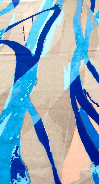 Seda francesa con estampado de pinceladas verticales azul rey, turquesa y salmón sobre arena